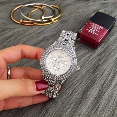 Item Type: Rhinestone Watches Movement: Quartz Case Material: Stainless Steel Dial Window Material Type: Glass Band Material Type: Alloy Clasp Type: Bracelet Clasp Dial Diameter: 3.8 cm Case Thickness: 0.9 cm Band Length: 22 cm Band Width: 1.8 cm Features: Quartz Watches for Women, Rhinestone Watches, Luxury Watches for Women, Modern Watches, Stainless Steel Watches Package Includes: 1 x Watch Elegant Iced Out Diamond Watch For Party, Silver Cubic Zirconia Diamond Watch For Party, Silver Diamond Watch With Cubic Zirconia For Parties, Diamond Watch With Rhinestones For Party, Silver Diamond Watch Iced Out For Party, Silver Diamond Bling Watch For Parties, Gold Diamond Watch With Rhinestones And Cubic Zirconia, Gold Crystal Diamond Watch For Formal Occasions, Silver Diamond Watch With Crystal For Parties