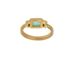 Striking in its monochromatic color, this Brooke Gregson ring is perfect as an alternative to the traditional engagement ring or as an everyday right hand ring. The center rectangular emerald is set in a hand fabricated 18K yellow gold bezel and centered on the 18K yellow gold band between two additional baguette emeralds. emeralds : vary : 3mm x 2mm to 5mm x 8mm each : 1.17cttw18K yellow gold band width : 2mmsize available : 6.75please contact us for sizing options Rectangular Gold Emerald Ring With Bezel Setting, Elegant Rectangular Emerald Signet Ring, 14k Yellow Gold Emerald Ring With Rectangular Stone, Formal Emerald Ring With Rectangular Stone And Bezel Setting, Yellow Gold Square-cut Emerald Promise Ring, Yellow Gold Emerald Ring For Promise With Square Cut, Rectangular Emerald Ring In Yellow Gold, Square Cut Emerald Ring In Yellow Gold For Promise, Luxury 14k Gold Emerald Ring Rectangular Shape