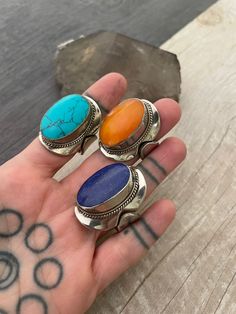 Unique statement rings, made with alloy metal  dyde stones, Turquoise, Lapis and Resin. A simple yet powerful design that makes these the perfect everyday ring for you to wear with any outfit. When you buy a ring, it comes in its smaller size, the original size but can be adjusted to bigger sizes by creating a gap on the side of the ring. It is not possible to adjust to a smaller. You will see a picture with the dimensions of the ring. A unique addition to your ring collection and a perfect matc Bohemian Oval Crystal Ring Nickel-free, Bohemian Oval Crystal Ring Nickel Free, Bohemian Style Oval Crystal Ring Nickel Free, Bohemian Oval Metal Rings, Unique Oval Nickel-free Ring, Nickel Free Oval Crystal Ring, Unique Oval Rings With Natural Stones, Bohemian Oval Ring With Large Stone, Adjustable Oval Metal Rings