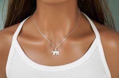 This bear necklace is made of 925 sterling silver. It comes complete with a small bear pendant, and your choice of chain. Choose your chain length and style from the drop down menu. This bear necklace includes: - a bear charm (13 x 18 mm | approx 1/2 inch x 3/4 inch) - an anchor, rope, curb or snake chain (16 to 36 inches) ADD INITIAL CHARMS: https://etsy.me/3gMPv4r ADD BIRTHSTONE CHARMS: https://etsy.me/3gGTLT4 ADD BIRTHSTONE BEAD CHARMS: https://etsy.me/3gGltzv SILVER POLISHING CLOTH: https:// Polar Bear Necklace, Bear Jewelry, Silver Bear, Bear Brown, Bear Cub, Chit Chat, Bear Necklace, Bear Pendant, Jewelry Card