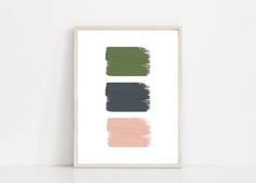 three different shades of green, pink and grey on a white background with a wooden frame