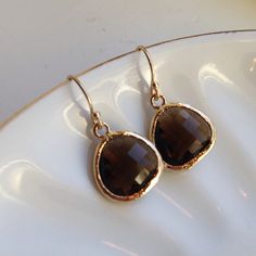 READY TO SHIP! Smoky Brown Earrings Gold Plated - Bridesmaid Earrings - Wedding Earrings - Bridesmaid Jewelry The smoky quartz/brown earrings are 13mm with 5mm at the thickest part. They are 16k gold plated glass gems. The earwires are 14k gold filled. The length of the earrings is approximately 1 inch. You are sure to stand out in these beautiful earrings! All of my items include a gift box for easy gift-giving for your friends or for yourself! I love custom orders! If you are a looking for a b Ravenclaw Party, Blue And Bronze, Brown Earrings, Brown Jewelry, Earrings Bridesmaid, Glass Gems, Zodiac Jewelry, Celestial Jewelry, Zodiac Necklaces