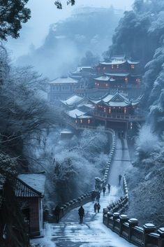 people walking down a path in the snow