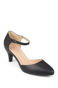 Step into chic style with the ankle strap comfort sole pumps by Journee Collection. These high-heels have premium faux leather uppers with almond-shaped toes. Dainty ankle straps and small stiletto heels complete the style. Sizing: True to size. M=medium width. Round toe. Ankle buckle closure. Approx. 2.5" heel height. Imported Classic Ankle-high Heels With Sculpted Heel, Classic Ankle Strap Kitten Heels With Padded Heel, Classic Kitten Heels With Heel Loop And Pointed Toe, Classic Kitten Heels With Pointed Toe And Heel Loop, Formal Kitten Heels With Penny Strap, Chic Closed Toe Heels With Penny Strap, Medium Width Kitten Heels With Heel Loop, Classic Ankle Strap Kitten Heels With Heel Loop, Fitted Kitten Heels With Heel Loop And Round Toe