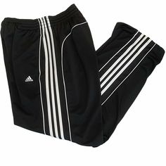 These joggers are in excellent used condition, no known flaws. Elastic and drawstring waist band. Front hip pockets. Black with white stripes down the sides. Straight leg. Silky fabric. 100% polyester. Machine washable. See pictures for measurements. ADIDAS Straight Leg Joggers Size L. Condition is "Pre-owned". Shipped with USPS Priority Mail. Adidas Three Stripes Joggers For Streetwear, White Adidas Joggers For Jogging, Adidas White Joggers For Jogging, Casual Joggers With Three Stripes For Streetwear, Casual Streetwear Joggers With Three Stripes, Casual Adidas Logo Joggers For Streetwear, Adidas Joggers For Streetwear, Casual Adidas Joggers For Streetwear, Sporty Moisture-wicking Joggers For Streetwear