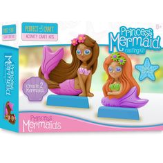 the princess mermaid craft kit includes two little mermaids, one sitting on a starfish