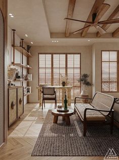 a living room filled with furniture and lots of wooden beams on the ceiling, along with large windows