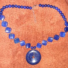 Beautiful, Deep Blue Lapis Lazuli Necklace With Silver Beads. 50mm Round Donut Shape 6mm-8mm Round Bead 16mm Concave Square Bead Necklace Is 20", With 2" Extension. Nwt, Never Worn. Blue Beaded Necklaces As Gift, Lapis Lazuli Beaded Necklaces For Jewelry Making, Blue Necklaces With Natural Stones, Round Lapis Lazuli Beaded Necklaces For Jewelry Making, Blue Necklaces With 8mm Beads As A Gift, Blue Necklaces With 8mm Beads For Jewelry Making, Blue Necklaces With 8mm Beads For Gift, Sapphire Jewelry With 8mm Beads, Blue Jewelry With Polished Round Beads