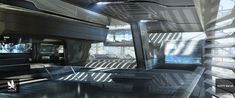 the interior of a futuristic looking building with lots of windows