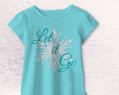 a t - shirt with the words let it go written in blue and silver ink