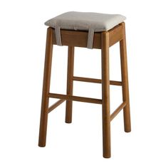 a wooden stool with a seat cushion on the bottom and backrest, against a white background