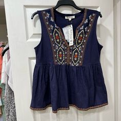 New With Tag. Size M Boho Embroidered Navy Blue Blouse Super Cute Similar To Free People Or Madewell Styles Casual Sleeveless Embroidered Top For Summer, Sleeveless Tops With Floral Embroidery For Vacation, Casual Sleeveless Embroidered Top For Vacation, Floral Embroidered Sleeveless Blouse For Beach, Sleeveless Floral Embroidery Tops For Vacation, Floral Embroidery Sleeveless Blouse For Beach, Casual Cotton Tank Top With Floral Embroidery, Casual Sleeveless Top With Multicolor Embroidery, Casual Floral Embroidery Tank Top For Vacation