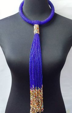 African beaded necklace made with the royal blue beads. Its a perfect accessory that will match most of your outfits. Suitable for any season. A good gift to your friends and loved ones. Elegant Royal Blue Beaded Necklaces With Round Beads, Elegant Royal Blue Beaded Necklace With Round Beads, Blue Long Necklace For Party, Elegant Long Blue Beaded Necklace, Elegant Blue Large Beads, Elegant Blue Beaded Necklaces With Large Beads, Elegant Large Blue Beads, Elegant Blue Beaded Necklace With Large Beads, Elegant Blue Beaded Necklace