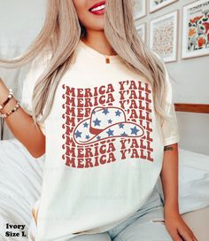 Celebrate in style with our "Merica Y'all" retro Fourth of July shirt. This oversized comfort colors tee adds a Western-inspired flair to your 4th of July outfit. ⭐️ * I T E M * I N F O* ✦ Comfort Colors Unisex Shirt ✦ 100% Ring-Spun Cotton ✦ Printed using Direct To Garment style- Inks are printed directly into the fabric. ✦ Different sizing may effect placement of final design. ✦ Colors may differ slightly due to different user monitor and screen settings. 📏 * S I Z I N G * ✦ Shirts are true-t Retro American Flag Print Summer T-shirt, American Retro Graphic Print Summer Tops, Summer Americana Style Relaxed Fit T-shirt, Summer Americana T-shirt With Relaxed Fit, Summer Americana Relaxed Fit T-shirt, Americana Style Short Sleeve T-shirt For Summer, American Flag Print T-shirt For Spring, Americana Short Sleeve T-shirt For Summer, Spring American Flag Print Relaxed T-shirt