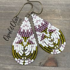 Astrid Earrings, beaded teardrop earrings with white background.   I love this intricate floral design.  Different bead finishes bring so much depth and interest into the design.  These earrings are handwoven, hand beaded, and intricately designed.  Woven with small Miyuki glass seed beads and strong nylon thread to last a lifetime.   Bead weaving is a time consuming art, each tiny bead is selected and hand sewn one at a time with a needle and thread.  So much love and care goes into each piece. White Long Drop Earrings With Colorful Beads, Handwoven Teardrop Jewelry As Gift, Bohemian Teardrop Beaded Earrings, Handmade White Long Drop Teardrop Earrings, Handmade Artisan Teardrop Chandelier Earrings, Artisan Handmade Teardrop Chandelier Earrings, Elegant Teardrop Earrings With Tiny Beads, White Teardrop Chandelier Earrings, Beaded Teardrop Chandelier Earrings As Gift