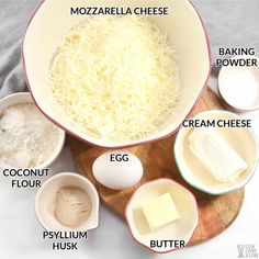 ingredients to make cheese pizza laid out on a cutting board