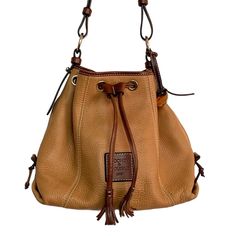 Dooney & Bourke Pebbled Leather Drawstring Bucket Purse Good Used Condition Pebbled Leather Cognac Slouchy Bucket Bag Drawstring Opening Shoulder Strap Basic Wear Bucket Purse, Basic Wear, Dooney & Bourke Bags, Dooney Bourke, Pebbled Leather, Drawstring Bag, Cognac, Bucket Bag, Shoulder Strap