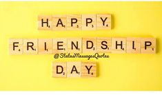 two scrabble tiles spelling happy, friendship, and day on a yellow background