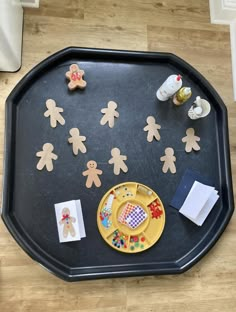 there is a tray with cookies and other items on it