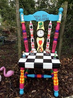 there is a colorful chair that has been made out of toothbrushes and other things