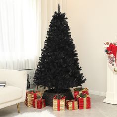 a black christmas tree surrounded by presents