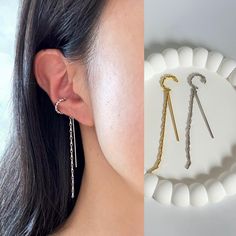 Perfect your style with our unique ear cuff earrings, meticulously crafted from high-quality materials. These ear cuffs will gracefully hug your ear without the need for piercing, ensuring a pain-free experience while infusing a captivating blend of elegance and edginess into your look.  ✨Sold as a single or pair. 🌟  Explore our wide range of ear accessories for no pierced ears in our Ear Cuffs/Earrings category. 🎁 Our ear cuffs are the perfect gift, whether for yourself or a loved one. 📦 Shi Trendy Dangle Ear Climbers As Gift, Elegant Dangle Cartilage Earrings With Adjustable Chain, Dainty Dangle Single Ear Cuff, Dainty Single Dangle Ear Cuff, Metal Dangle Ear Cuff Single Earring, Metal Dangle Ear Cuff, Minimalist Metal Ear Cuff With Adjustable Chain, Elegant Adjustable Dangle Ear Cuff, Metal Dangle Ear Cuff With Adjustable Chain