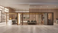 an empty room with glass walls and wooden paneling on the wall is pictured in this rendering