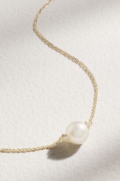 Each one of Mizuki's pieces are at once distinctive and understated - this necklace is a perfect example. Made from 14-karat gold, it's strung with a sizeable freshwater pearl punctuated with a light-catching diamond on either side. Wear yours with décolletage-baring tops and dresses. Refined Yellow Gold Akoya Pearl Necklace, Fine Jewelry Akoya Pearl Necklace With 17 Jewels, Diamond Pearl Necklace For Wedding, Graceful Pearl Chain Necklace For Formal Occasions, Wedding Diamond Pearl Necklace Single Strand, Wedding Diamond Single Strand Pearl Necklace, Wedding Single Strand Diamond Pearl Necklace, Luxury Akoya Pearl Necklace With Diamond Accents, Fine Jewelry Yellow Gold Diamond Necklace With Pearl Pendant