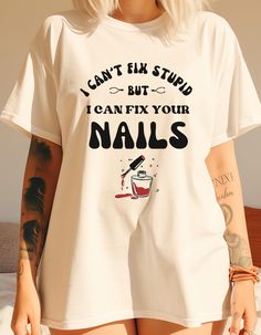 This funny retro "nail tech" shirt would make the perfect appreciation gift for your favorite nail artists! Get ready to add a splash of humor to your workday with our "I can't fix stupid but i can fix your nails" funny t-shirt! Perfect for nail technicians who love to keep things lighthearted, this shirt is sure to bring smiles to your clients' faces.  Show off your fun side and break the ice with clients wearing this sarcastic and funny nail tech tee. Comfort Colors introduces the "Comfort Col Nail Tech Merch, Gifts For Nail Techs, Gifts For Nail Technicians, Nail Tech Shirt Ideas, Tech Gift, Tech Shirt, Artist Gifts, Comfort Colors Shirt, Tech Gifts