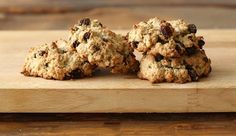 three oatmeal cookies stacked on top of each other with raisins