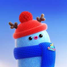 a snowman wearing a red hat and scarf