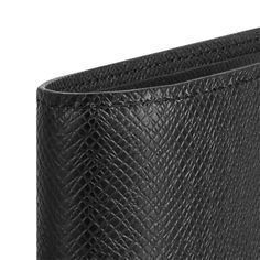 LOUIS VUITTON® - Multiple Wallet - Black Luxury Black Trifold Wallet For Formal Occasions, Luxury Black Wallets With Coin Pocket, Luxury Black Wallet With Coin Pocket, Luxury Black Trifold Wallet With Coin Pocket, Black Trifold Wallet With Card Slots For Formal Use, Black Textured Leather Bifold Wallet, Luxury Black Trifold Wallet For Business, Formal Black Trifold Wallet With Interior Card Slots, Elegant Black Trifold Wallet For Formal Occasions