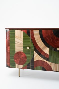 an art deco sideboard with abstract designs painted on it