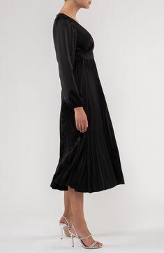 An empire waistline defines a satin long-sleeve midi dress with a pleated skirt for twirl-worthy appeal. 47" length (size Small) Back zip closure V-neck Long sleeves 94% polyester, 6% spandex Hand wash, dry flat Imported Model stats: 5'10" height, 32" bust, 25" waist, 36" hip. Model is wearing size Small. Midi Dres, Satin Long Sleeve, Empire Waistline, Long Balloons, Pleated Midi Dress, Satin Midi Dress, Long Sleeve Midi, Pleated Midi Skirt, Long Sleeve Midi Dress