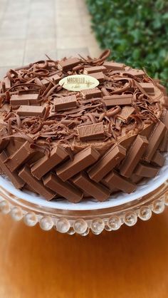 a large chocolate cake sitting on top of a table