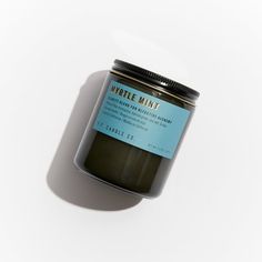 P.F. Candle Co. Myrtle Mint Alchemy Candle - Product - Alchemy Candles feature smoke-colored glass vessels, black metal lids, and gold-leafed labels inspired by vintage window lettering. Blue Eucalyptus, Kraft Labels, Black Fig, Amber Jars, Selling Candles, Vintage Windows, Irish Whiskey, Incense Cones, Glass Vessel