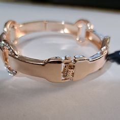 New With Tags This Sleek Rose Gold-Tone Bangle Bracelet Featuring O-Ring Accents With Rhinestone Details And Engraved Logo Hinge Closure Style: #14360382 Rose Gold Metal Bangle With Bracelet Strap, Adjustable Rose Gold Metal Crystal Bracelet, Formal Rose Gold Metal Chain Bracelet, Formal Rose Gold Chain Bracelet, Elegant Rose Gold Crystal Bracelet, Rose Gold Metal Crystal Bracelet For Party, Rose Gold Bangle Crystal Bracelet For Party, Adjustable Rose Gold Crystal Bracelet For Formal Occasions, Formal Round Metal Crystal Bracelet