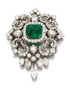 Handmade item Recycling: No Brooch weight: 25.780 Grams Brooch Length: 3.00 inches Brooch Width 2.00 inches Gemstones: Rose cut diamonds & Emerald Diamonds weight: 5.35 carats Diamond shape: Round & Pear Diamond Colure: Light Tinted Brown Emerald weight : 4.88 Carats Emerald: Lab Created Stone putting: Prong Material: Silver Silver purity: 925 Brooch Finished: Antique Luxury Pendant Brooch Jewelry, Luxury Exquisite Gemstone Brooches, Luxury Pendant Brooches, Luxury Round Gemstone Brooch, Luxury Green Pendant Brooches, Luxury Victorian White Gold Brooches, Luxury Green Diamond Brooches, Luxury Diamond Gemstone Brooches, Luxury Collectible Diamond Brooches