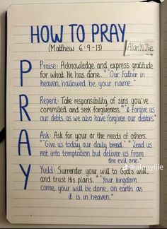 an open notebook with the words how to pray written on it