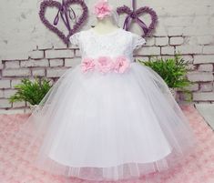 EMMA, white with pink, 3-piece, dress + headband + shoes We have shoes in sizes 10 cm, 11 cm, 12 cm, 13 cm - A wonderful pretty dress for your little princess + headband - All crafted with love and care, stunning and graceful - Condition: New - Material: 100% polyester decorated with an elegant bow **Available sizes - Size 56 - Size 62 - Size 68 - Size 74 - Size 80 - Size 86 - Size 92 - Size 98 - If you need a different size, just write to us - Please specify size **Please note - Sizes: +/-2cm t Summer Princess Dress For First Communion, Summer First Communion Fitted Princess Dress, Fitted Princess Dress For Baptism In Spring, Fitted White Tutu Dress For Confirmation, White Fitted Tutu Dress For Confirmation, White Princess Dress For Spring Wedding, White Princess Baptism Dress For Summer, White Princess Style Baptism Dress For Summer, Fitted Princess Dress For Summer Baptism