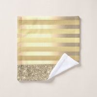 a gold and silver napkin on top of a white table