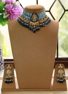 Kundan choker necklace with matching earrings Perfect for any kind of occasions and ceremonies. You can wear it with Saree lehenga and Evening Gowns. Highest quality and craftsmanship. Arrives in box Please let me know if you have any questions Traditional Blue Cutdana Necklace, Blue Meenakari Chandbali Necklace, Blue Meenakari Bridal Necklace In Temple Jewelry Style, Blue Temple Jewelry Set With Meenakari, Blue Bridal Necklace In Temple Jewelry Style With Meenakari, Blue Meenakari Temple Jewelry Set, Blue Temple Jewelry Bridal Necklace With Meenakari, Blue Chandbali Jewelry With Cutdana Detail, Blue Chandbali Jewelry With Cutdana