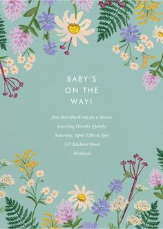 a baby's on the way card with flowers and leaves in pastel blue