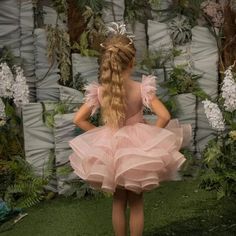 Indulge your little princess with the luxurious Jill Wish dress. Its delicate pink hue, adorned with feathers and a ball gown silhouette, is perfect for special occasions like birthdays, weddings, and holy communions. Make her feel like the belle of the ball and capture beautiful memories in this exquisite dress. Baby Flower Girl Dress, Formal Flower Girl, Kingdom Boutique, Dress Feathers, Gray Flower Girl, Purple Flower Girls, Photoshoot Christmas, Dress For Special Occasion, Purple Flower Girl Dress