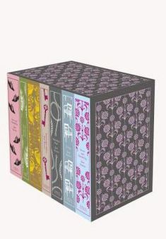 four different colored boxes with designs on them