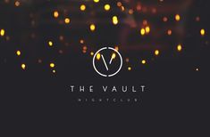 blurry image of lights with the word the vault written in white across the photo