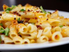 a white plate topped with macaroni and cheese