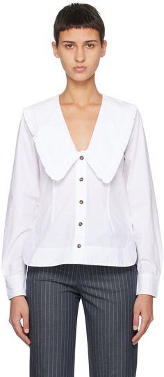 Organic cotton poplin shirt. · Ruffle trim at pointed Peter Pan collar · V-neck · Button closure · Vented side seams · Two-button barrel cuffs Supplier color: Bright white Peter Pan Collar Shirt, Cotton Poplin Shirt, Women Shirts Blouse, Poplin Shirt, Pan Collar, Peter Pan Collar, Neck Shirt, Ruffle Trim, Cotton Poplin