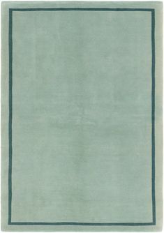 a light green rug with blue border