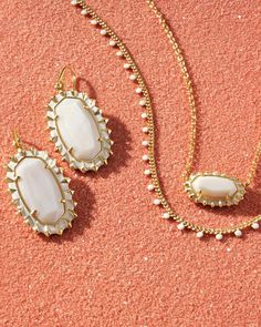 There’s truly no better way to top off your look than with a pop of color. Complete with dainty enamel embellishments, the Kendra Scott Kelsey Gold Strand Necklace in White Enamel is the vibrant yet minimal accessory your layers will love. Metal 14k Yellow Gold Over BrassMaterial White EnamelClosure Lobster Clasp W/ Single Adjustable Slider BeadSize 19" Chain Please note: Due to the one-of-a-kind nature of the medium, exact colors and patterns may vary slightly from the image shown. Kendra Scott products are thoughtfully crafted in their Austin, Texas studio, pushing the boundaries of design and innovation while staying true to their principles: color, shape, material, and value.The Twisted Chandelier Boutique is an authorized retailer of Kendra Scott. Dainty Jewelry Necklace, Short Pendant Necklace, Color Burst, Engagement Rings Sale, Bar Jewelry, Demi Fine Jewelry, Initial Jewelry, Kendra Scott Jewelry, Earring Sale